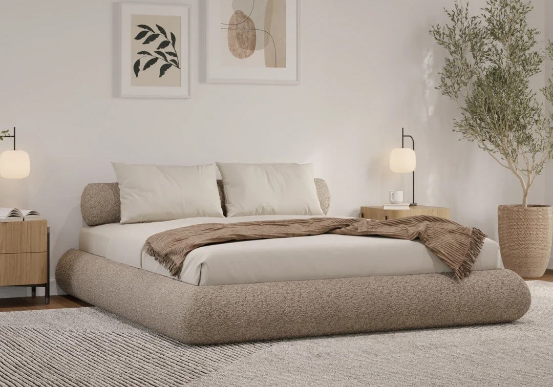 SoftFrame Designs Luna upholstered bed frame in neutral dune fabric, styled in a calm Japandi-inspired bedroom