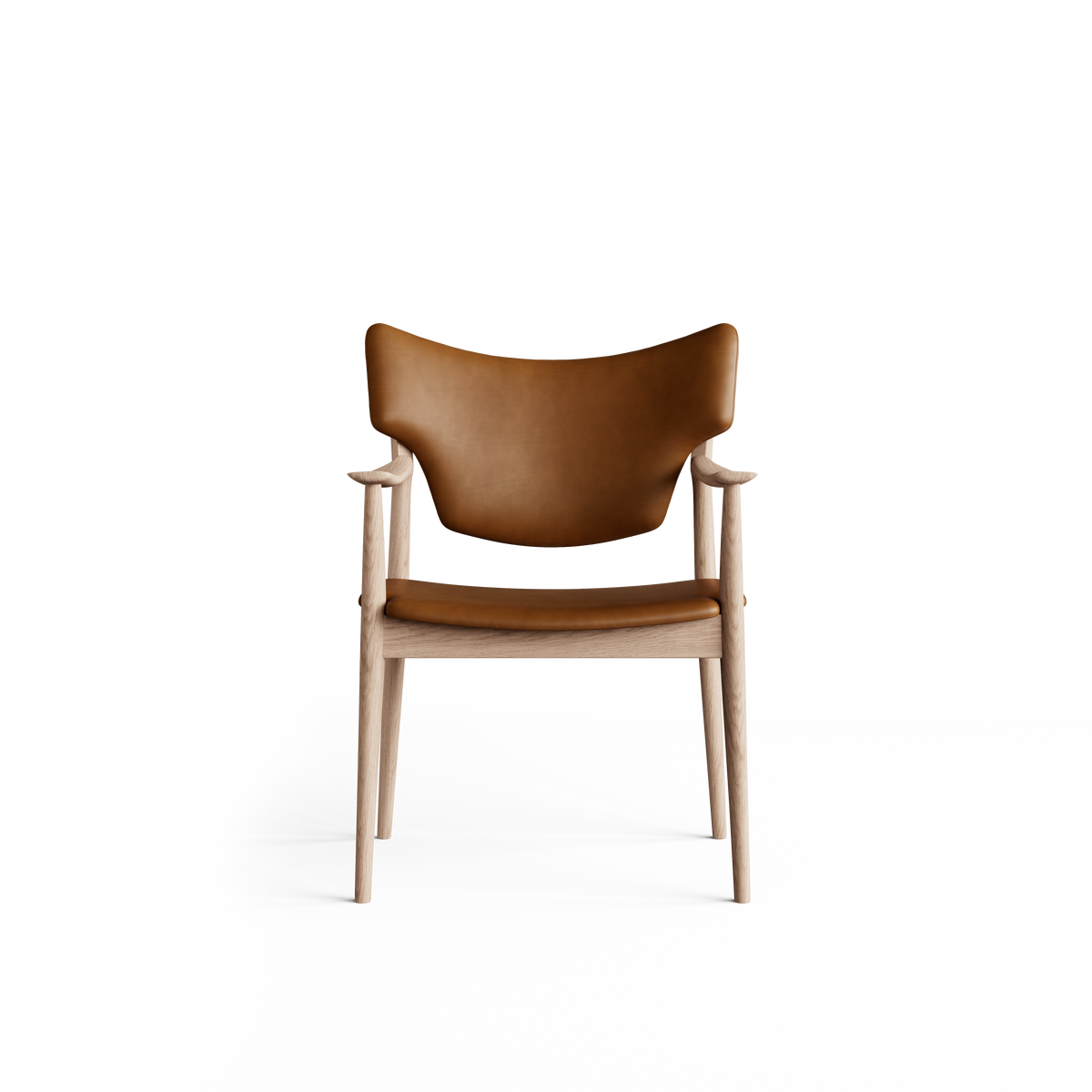 Front view of the cognac-brown Eikund Veng Arm Chair, showing raised backrest corners, gently curved wood armrests, and a slim seat above the exposed wood rail.