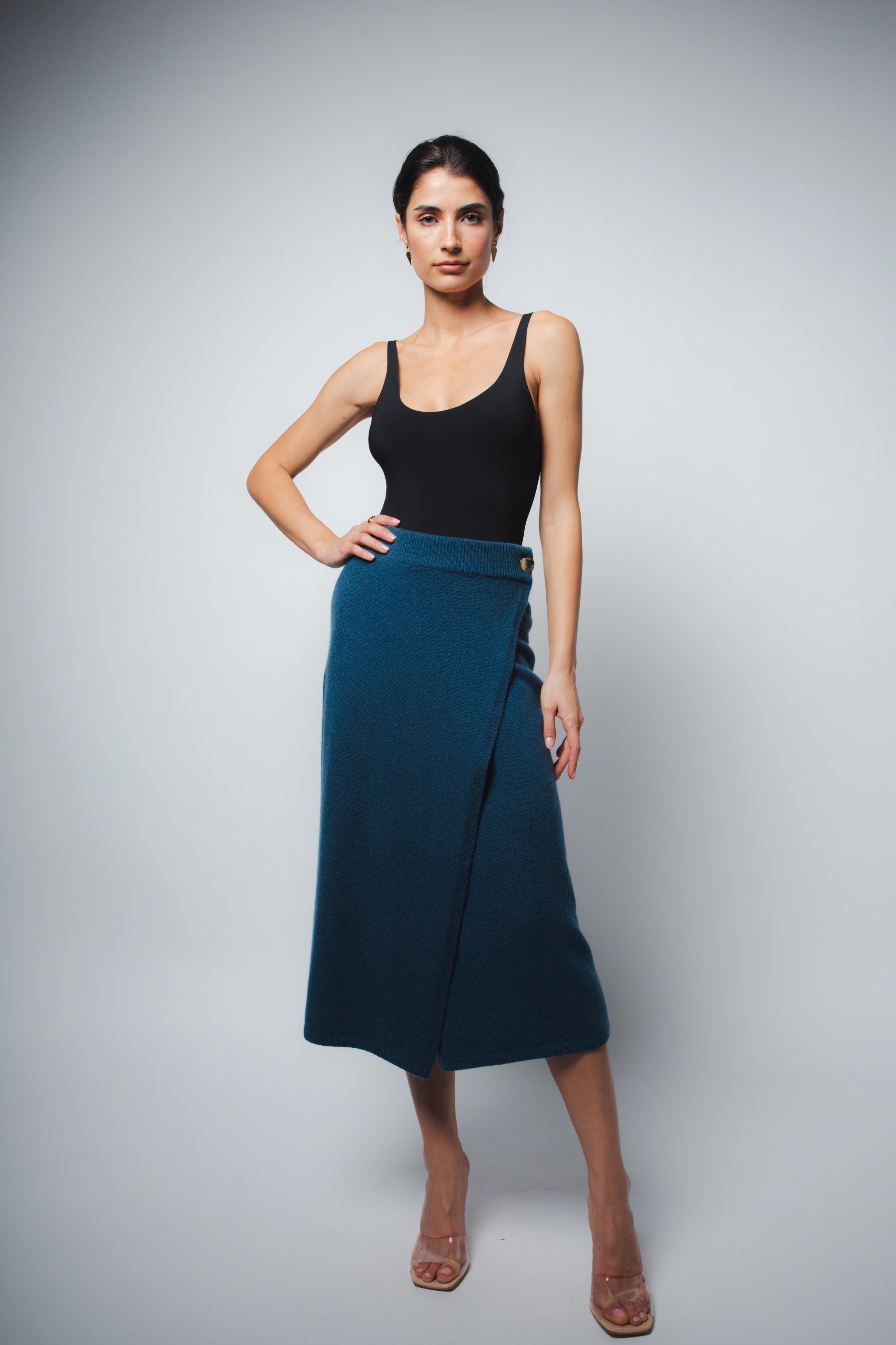 Lola Tank Bodysuit in black, styled front view with blue wrap skirt β Santicler Japandi fashion