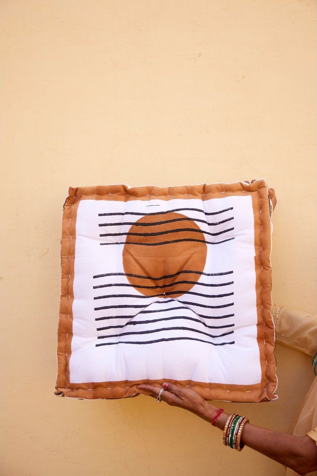 Ascension Floor Pillow against Wall