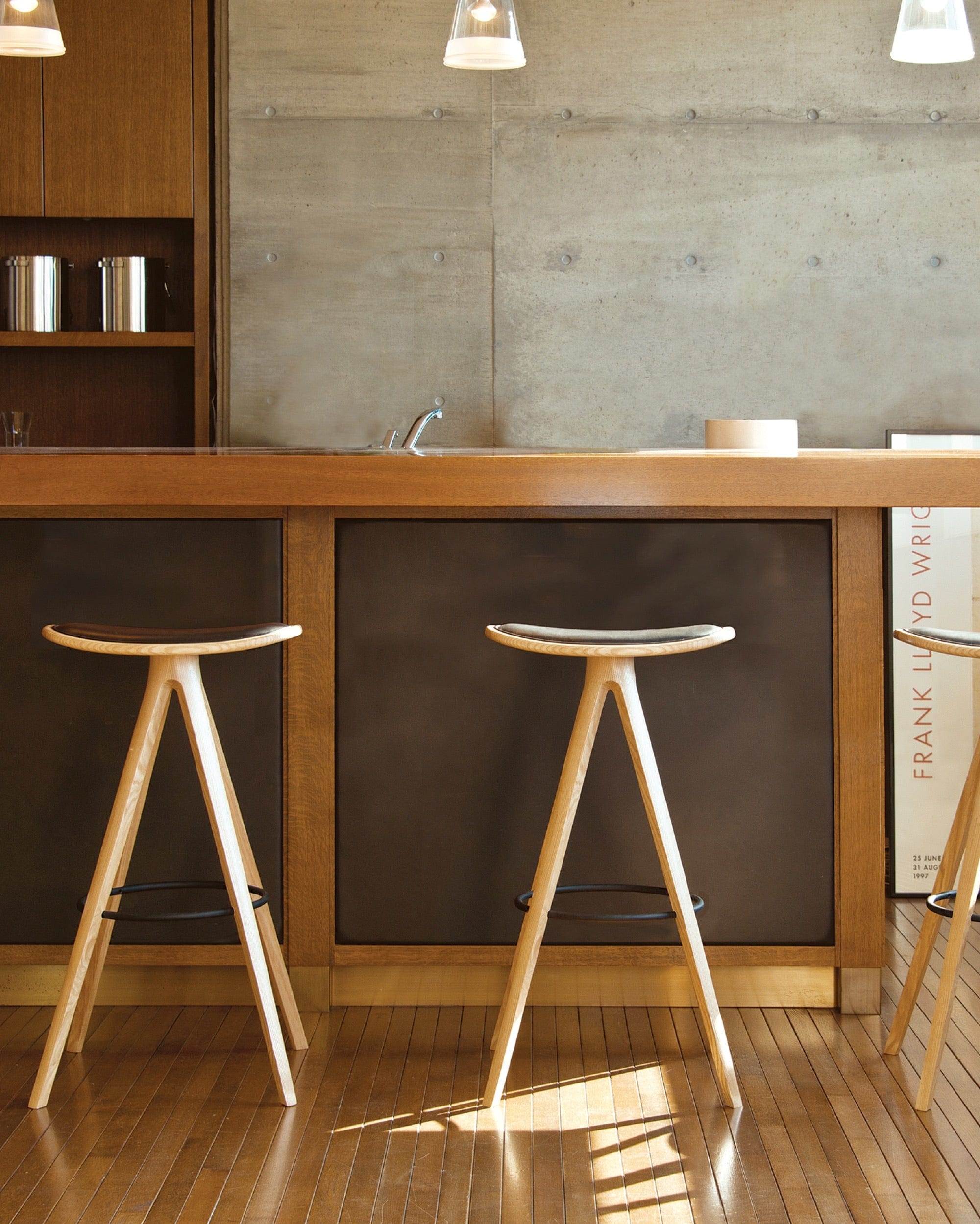 BCTD Bar Stool — solid Japanese ash wood bar stool with saddle-like seat and footrest ring.