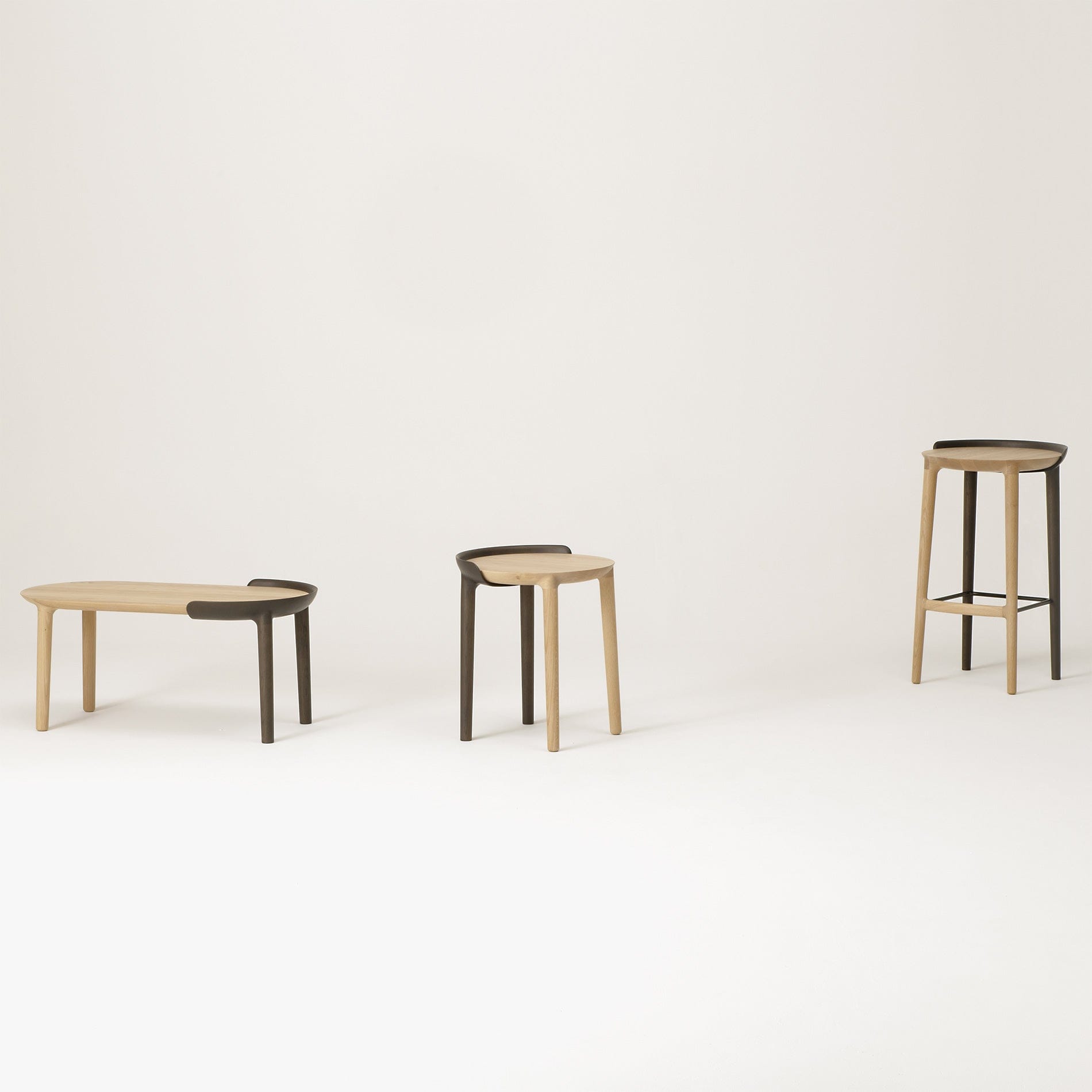 CRUST Bar Stool with coordinating CRUST stools in light, neutral setting — modern Japanese craftsmanship.