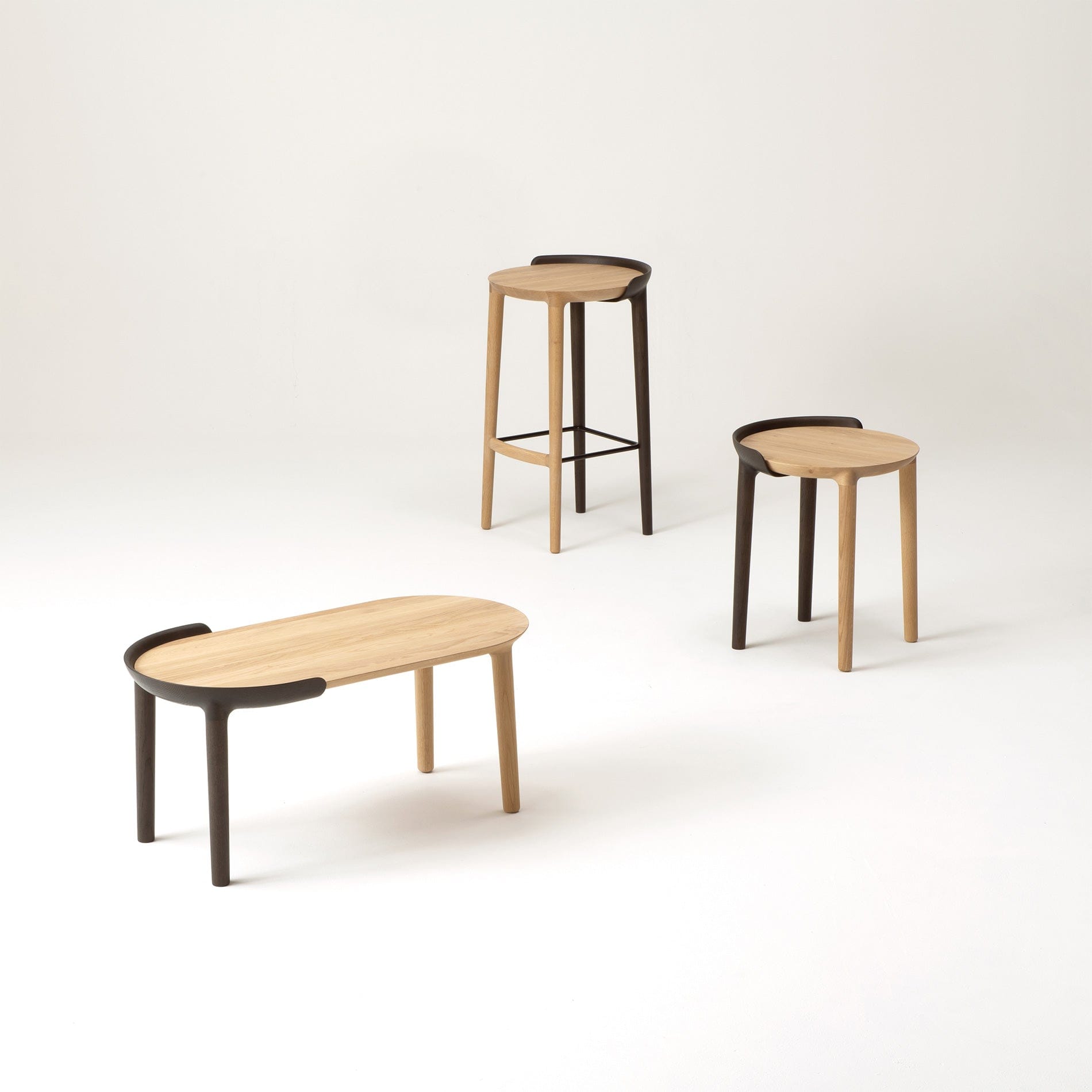 CRUST seating collection arranged in a Japandi-style interior — minimalist oak bar stools handcrafted in Japan.