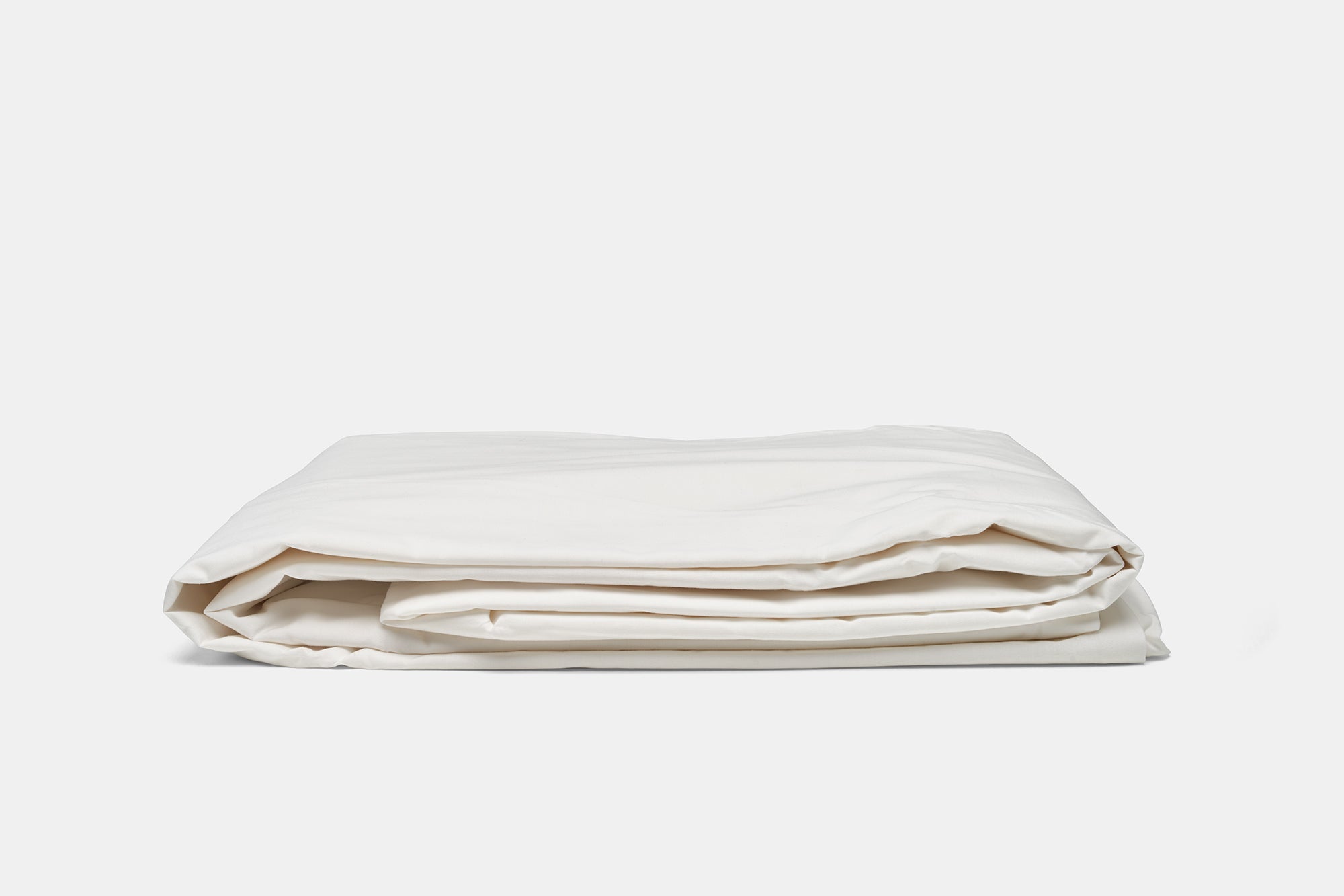 Folded American Blossom Linens cotton percale duvet cover set in white