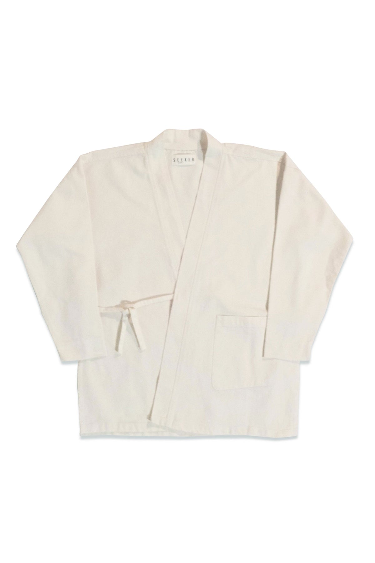 Front product view of the white GI wrap jacket with waist ties and patch pockets.