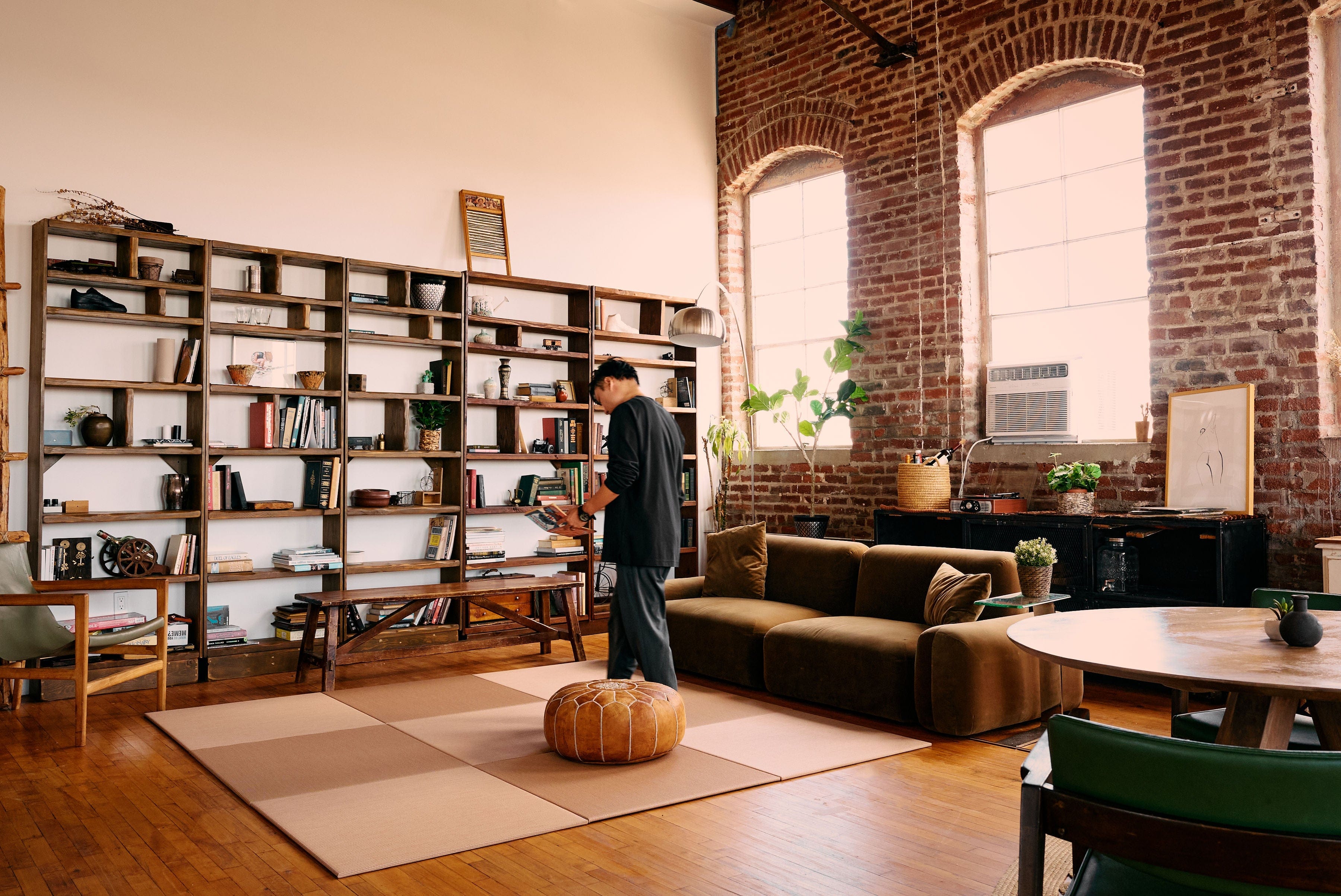 Japandi Tatami Mats in a loft with a man