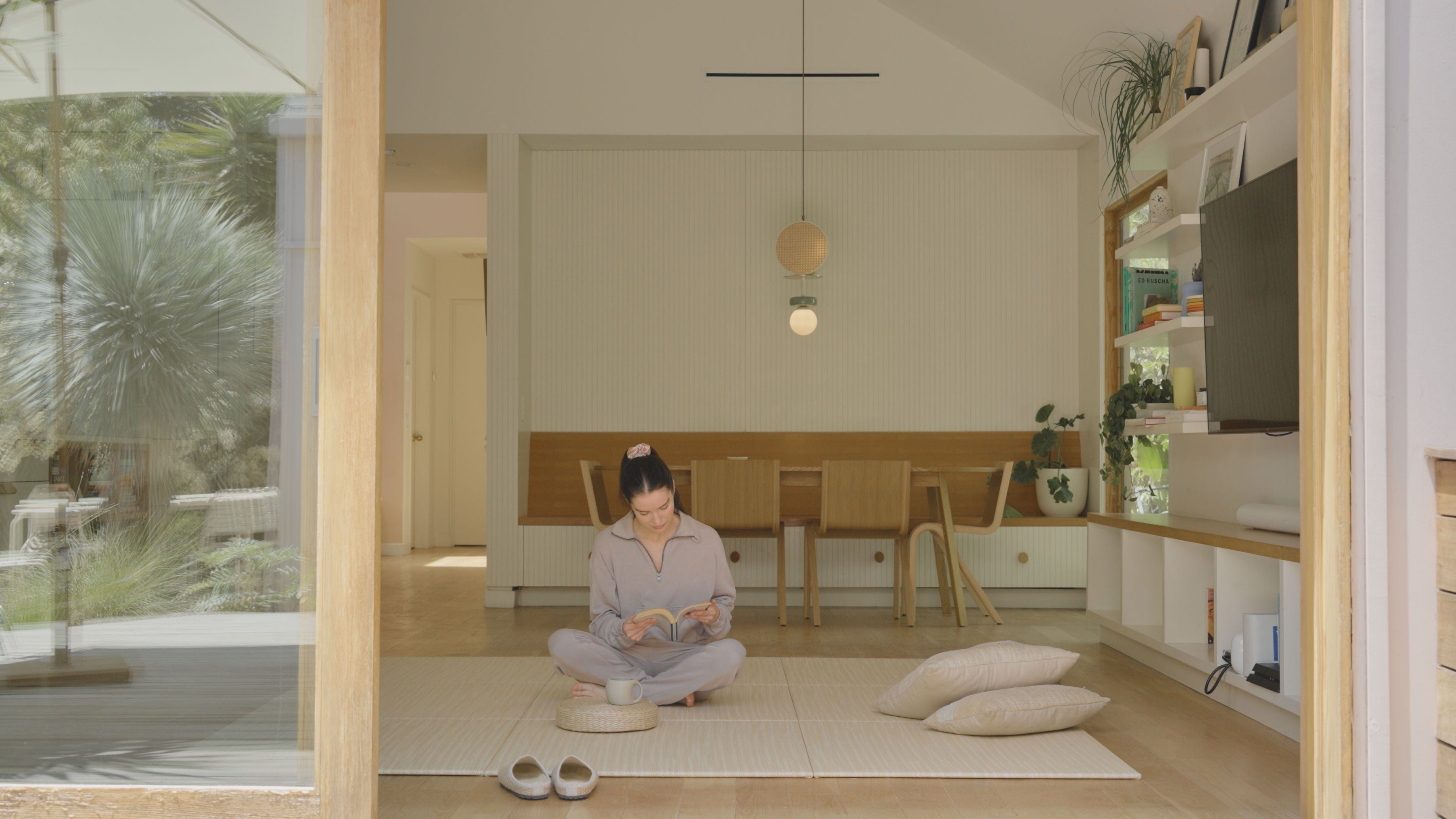 Japandi Tatami Mats in room with woman reading book