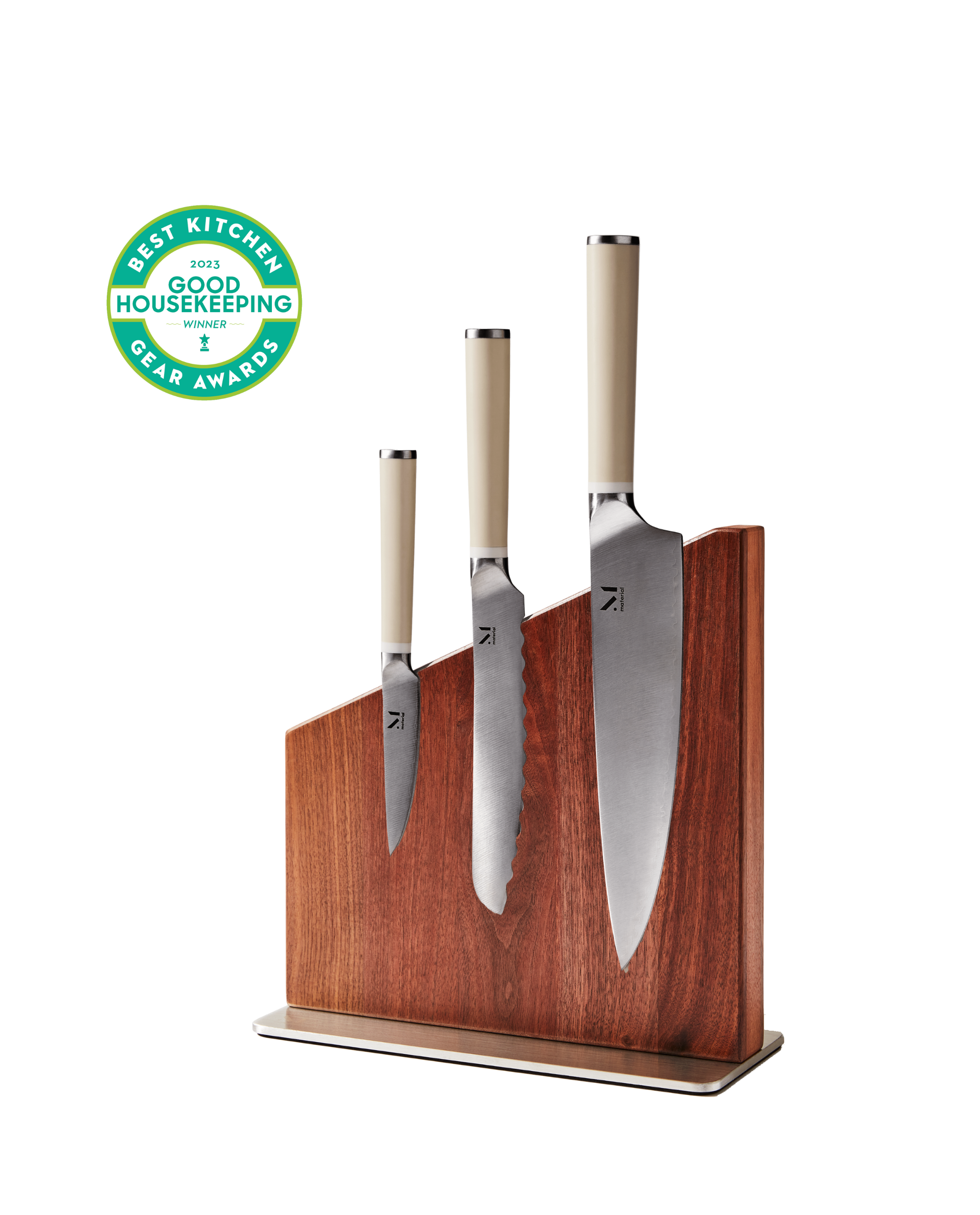 Japanese stainless steel knife trio displayed in magnetic wood stand