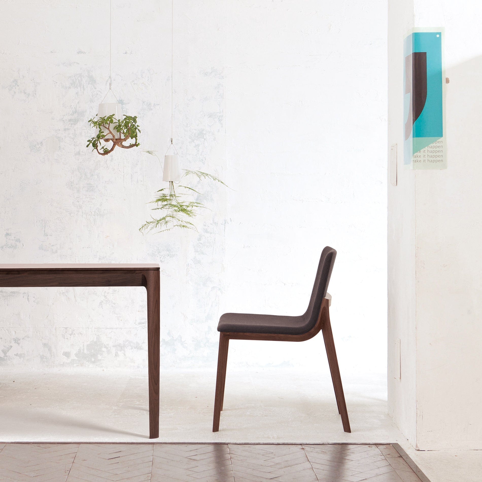 Minimalist dining space featuring CondeHouse CHALLENGE chairs and table