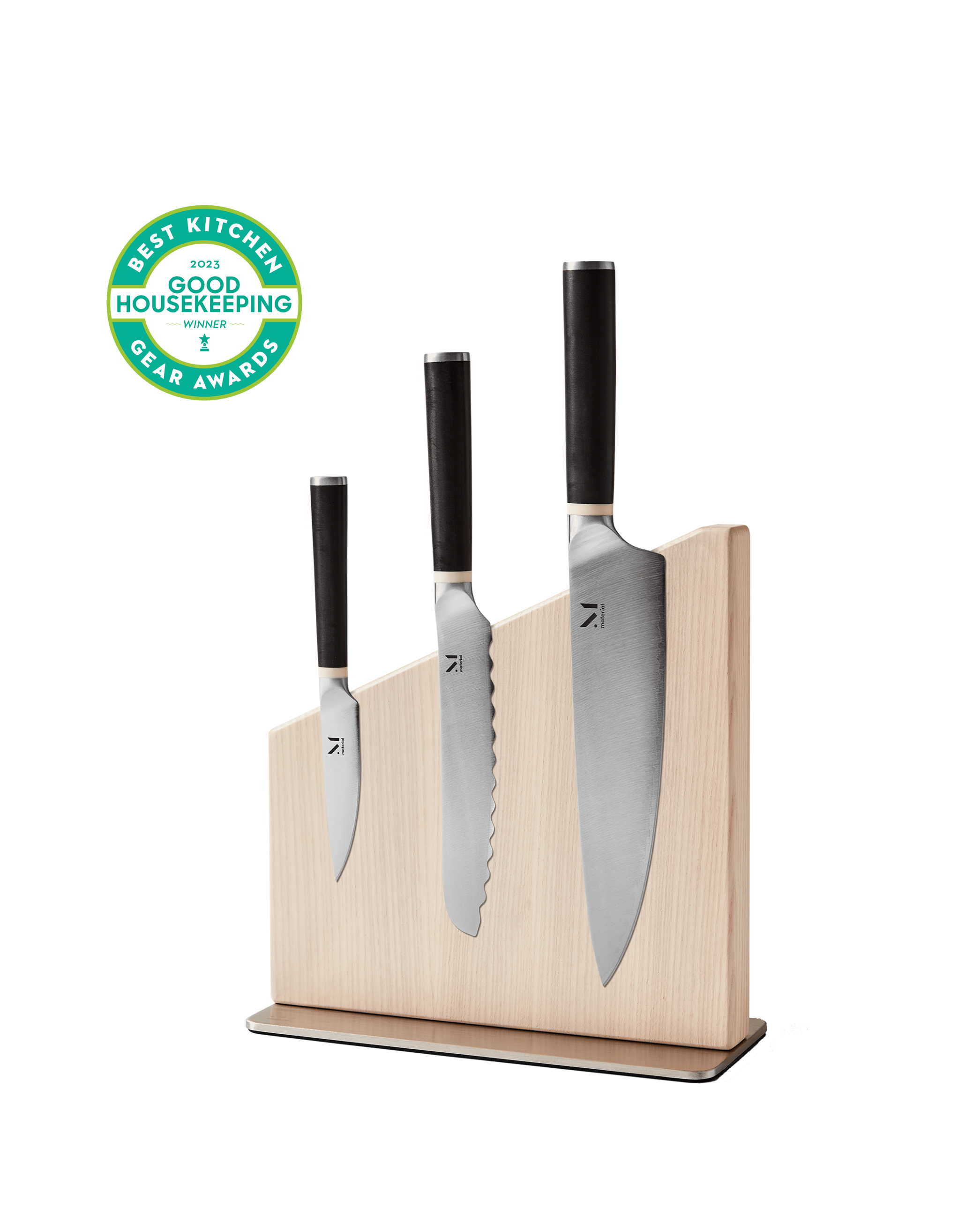 Modern magnetic knife stand with three Japanese-inspired kitchen knives