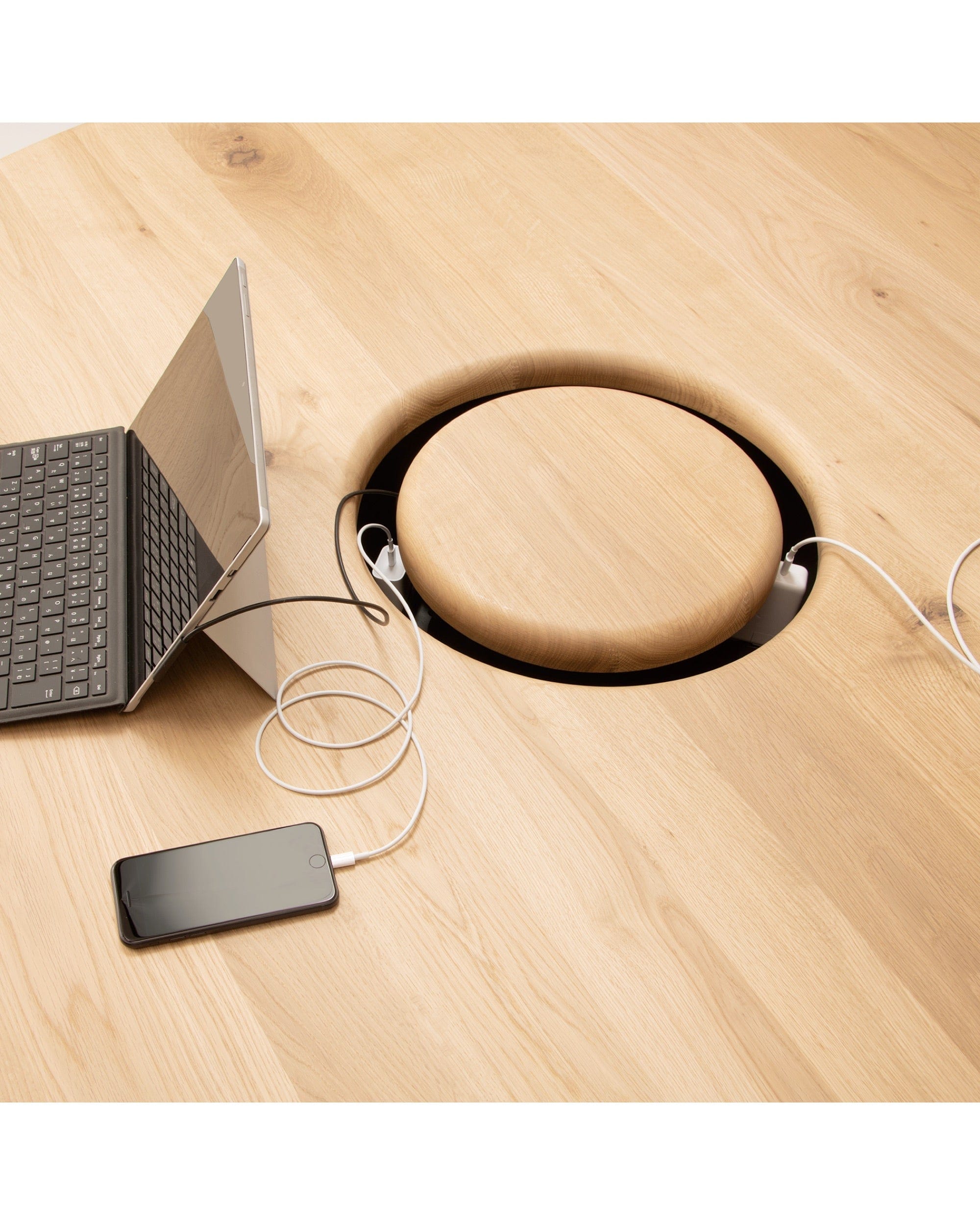 ONE Round Table Japanese Oak Natural CondeHouse round dining table with integrated power outlet detail