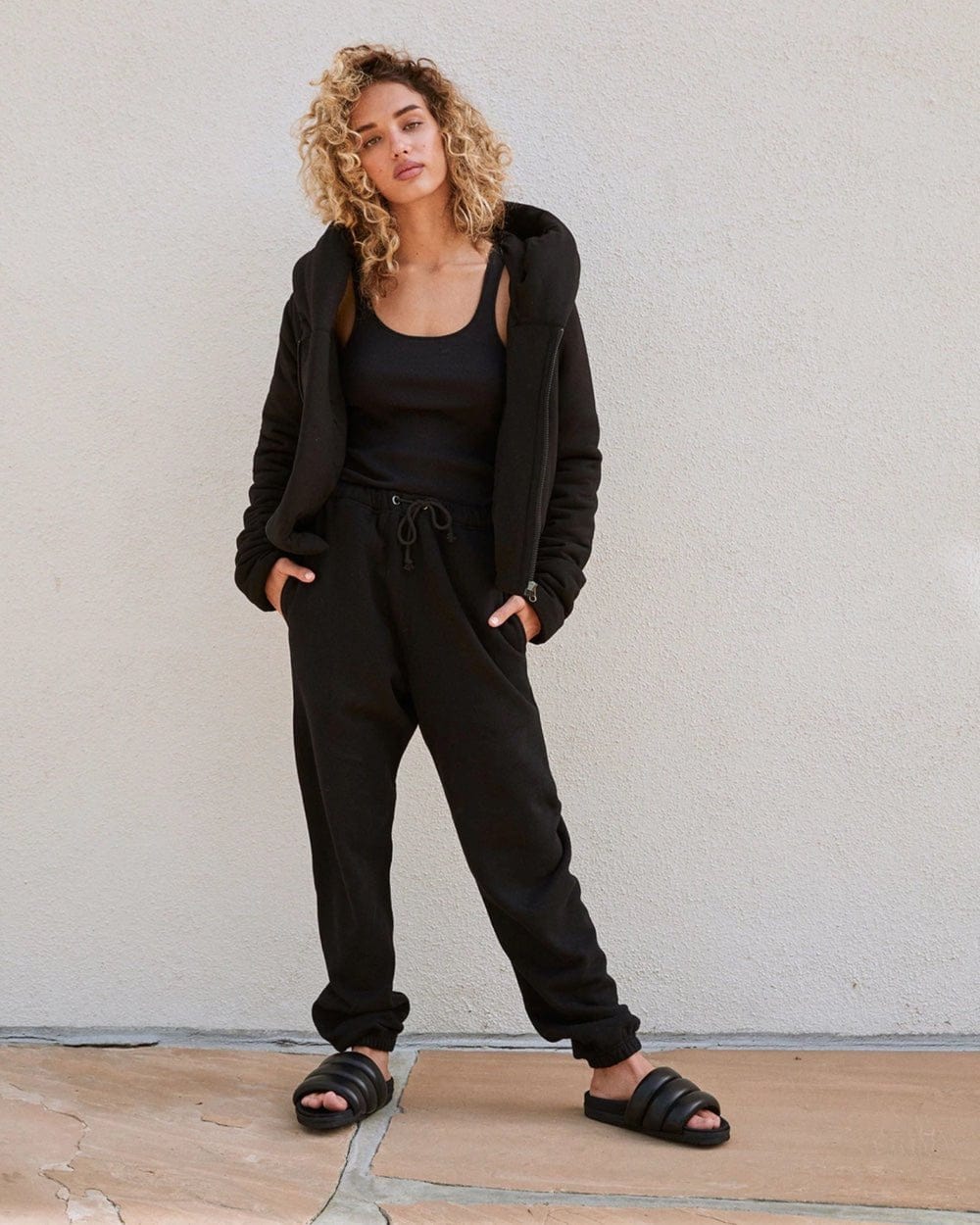 ROAM Puffy Sandals Black Vegan Leather on Person