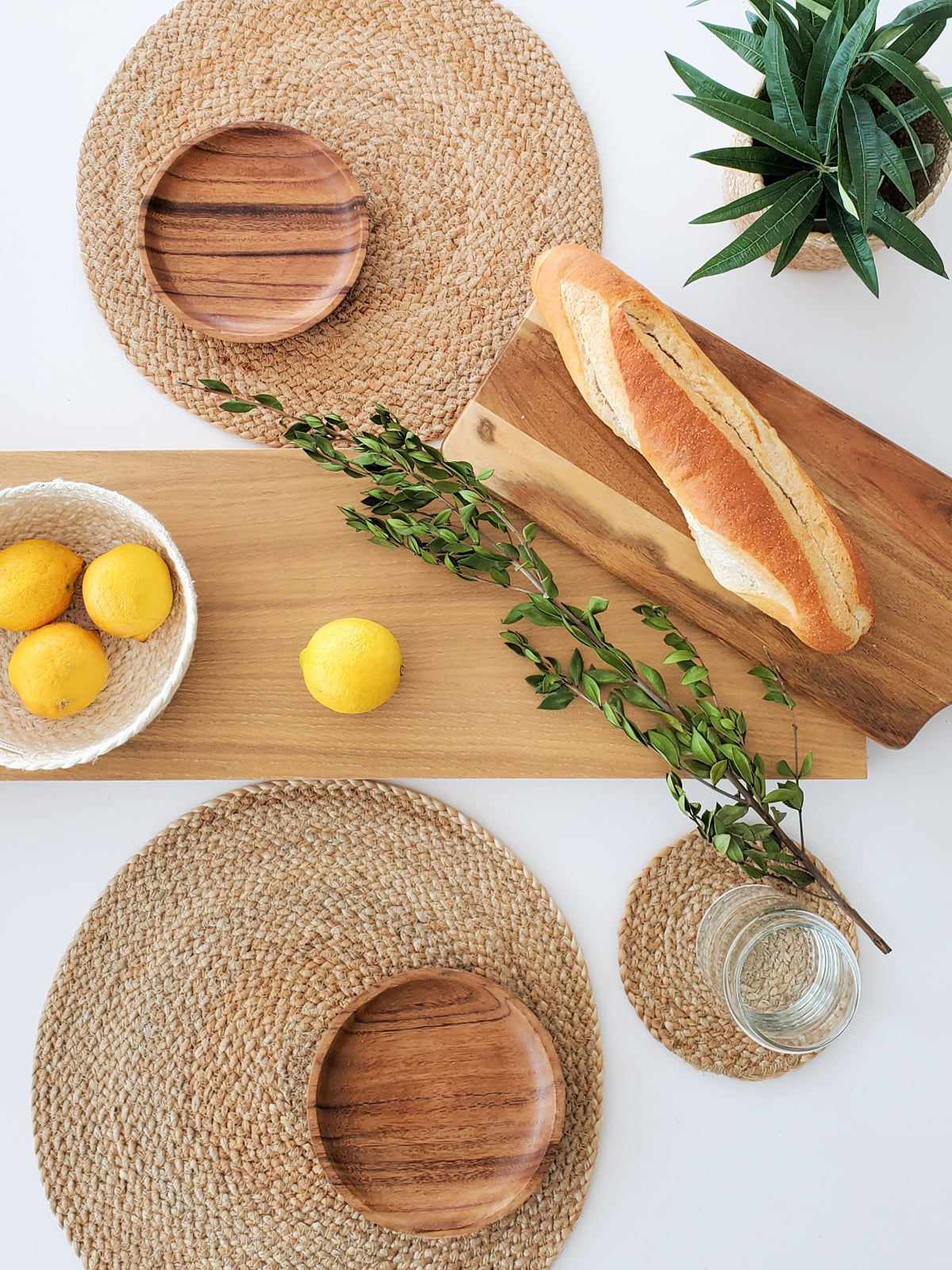 Korissa Kata Natural Placemat styled with wood plate, lemons, and bread