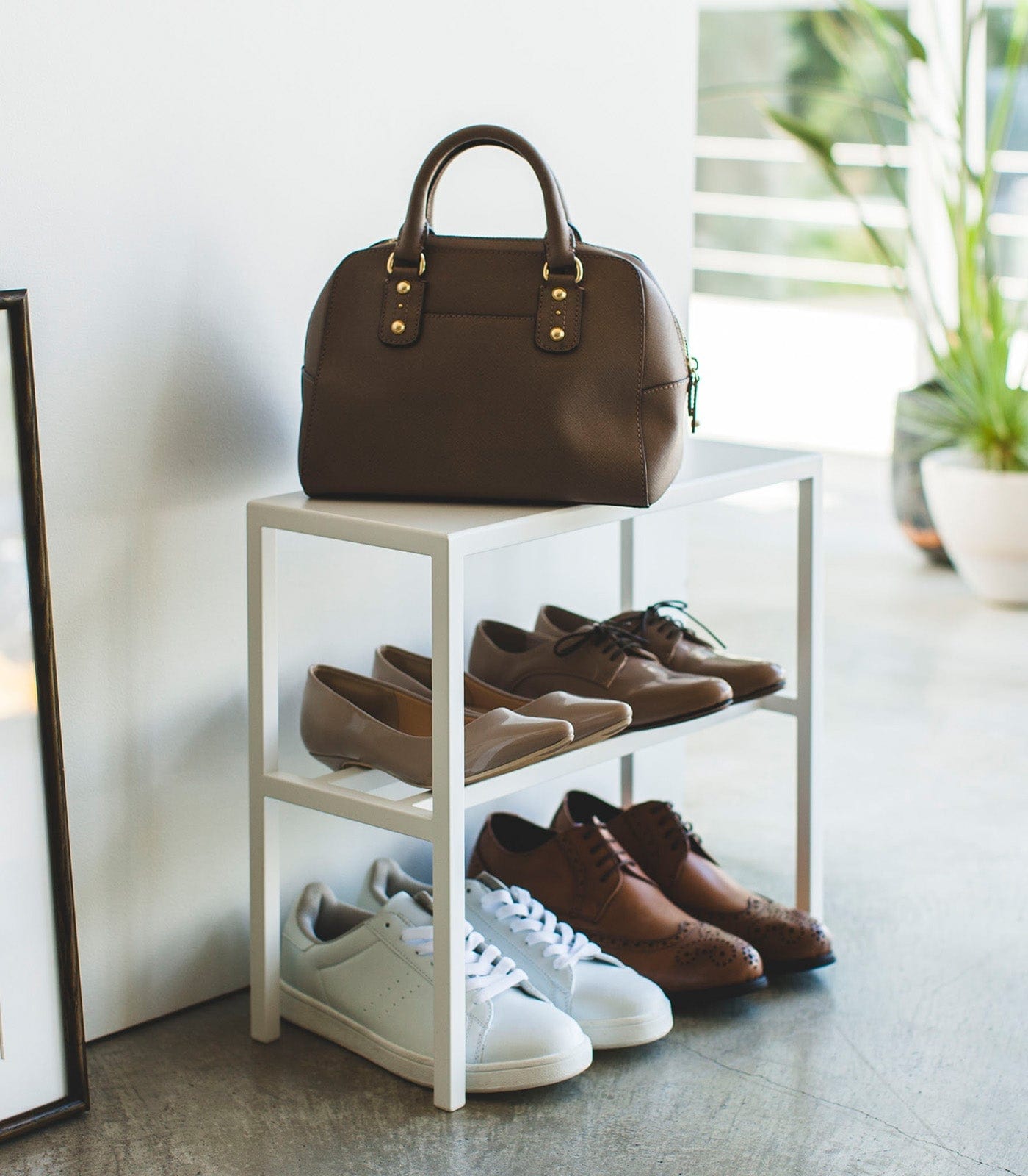 Shoe Organizer with Shelf (16" H) in White lifestyle with shoes in entryway
