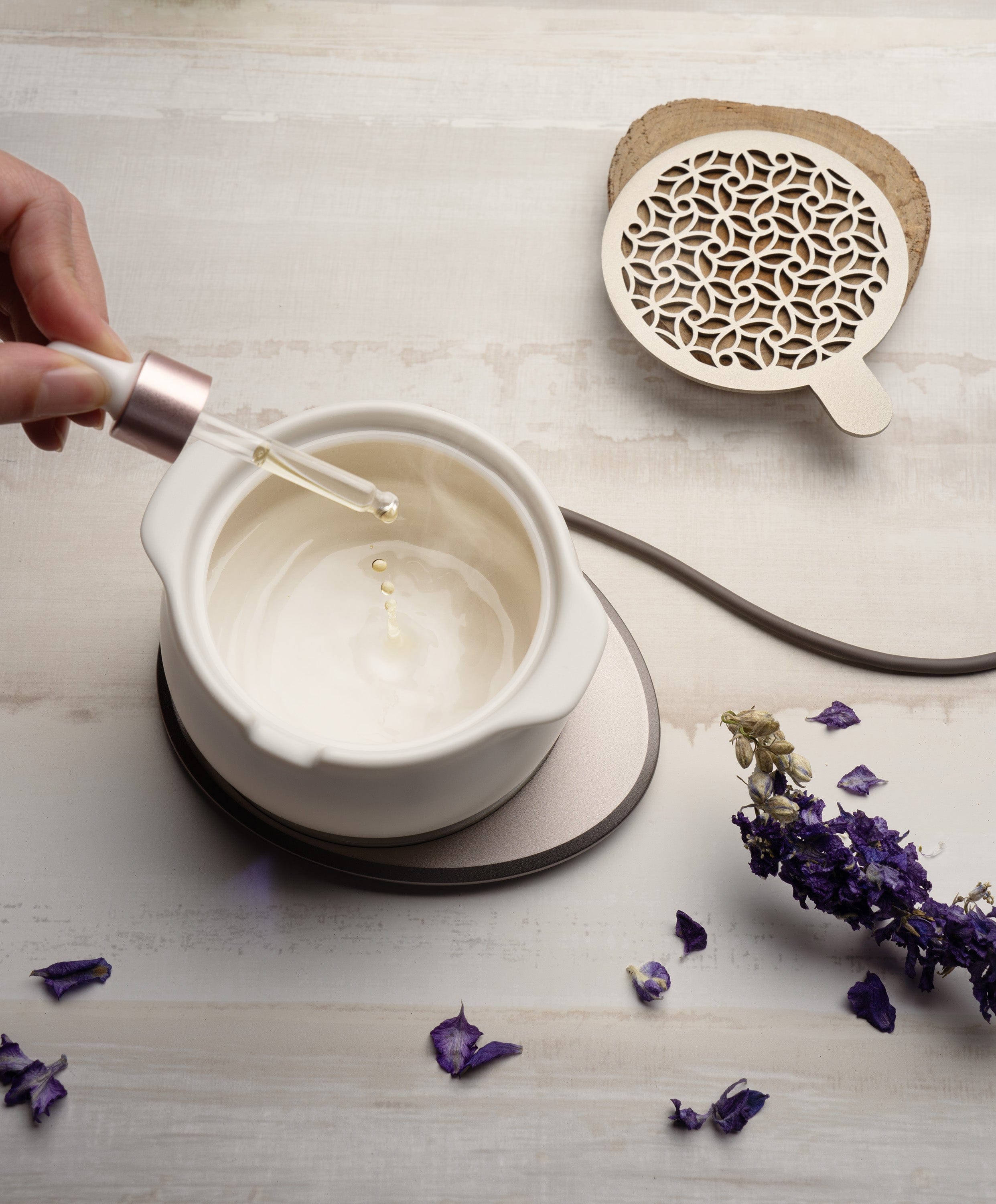 Top view of Jun diffuser releasing aroma through ceramic lid