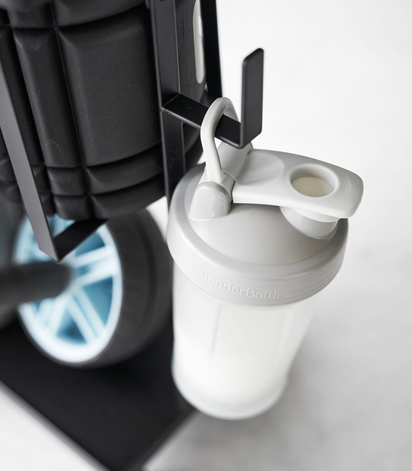 Water bottle hanging off Black Fitness Equipment Cart