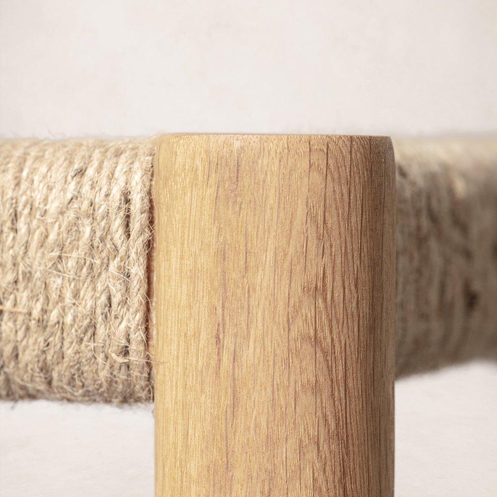 Close-up of white oak leg and jute rope seat on Nonna counter stool