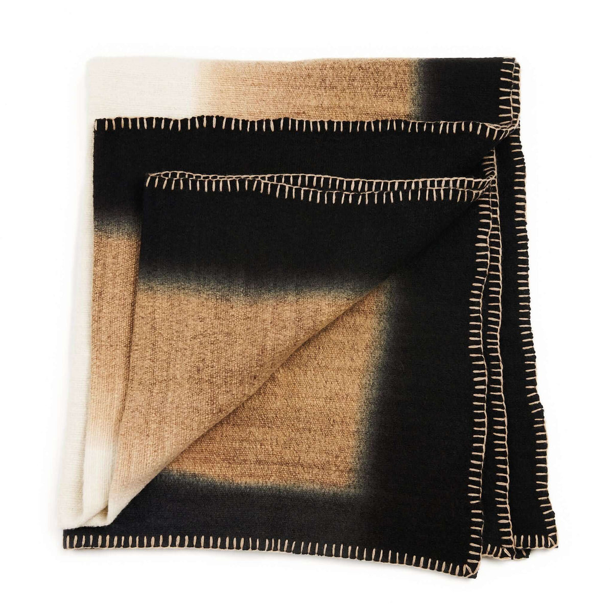 Siro Brown merino throw folded flat against a white background, showing its tan center, black border and stitched trim
