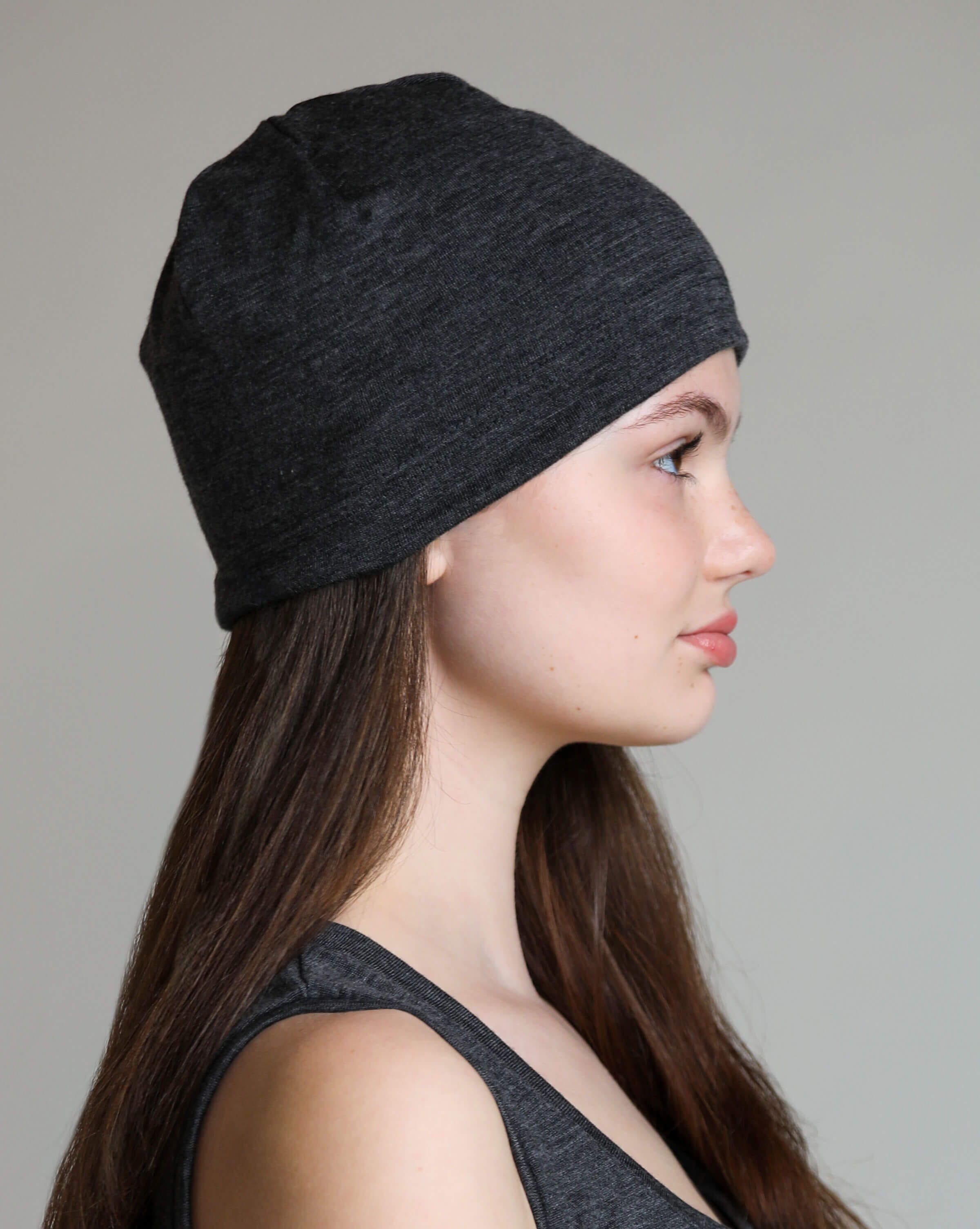 Side view of a lightweight merino wool sauna beanie showcasing breathable natural wool comfort and minimalist design.