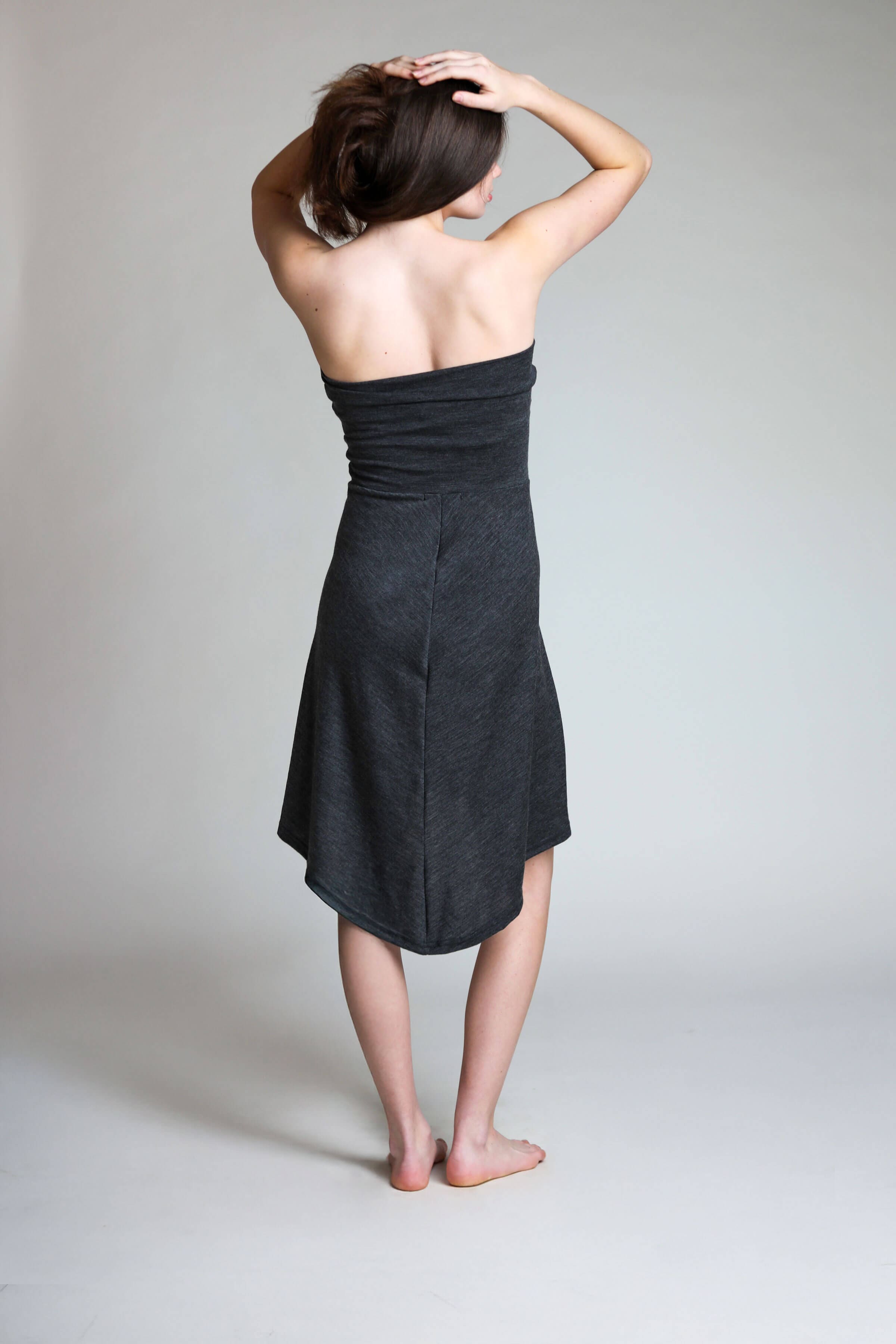 Back view of a strapless merino wool dress designed for sauna recovery, travel, and everyday wear.