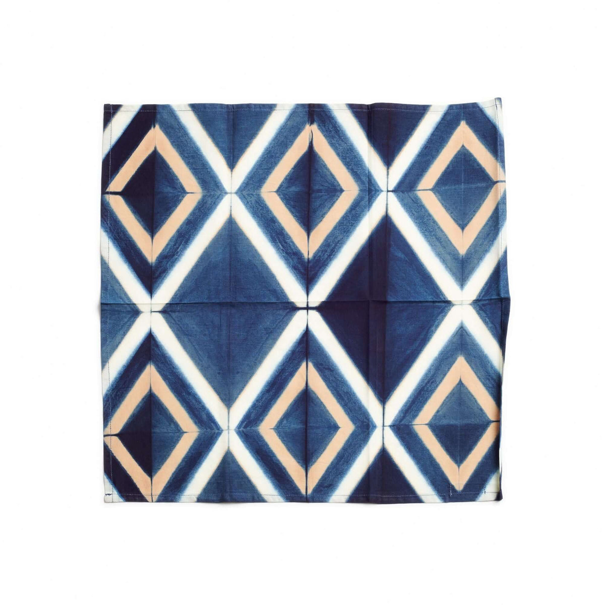 Blue color variation of the Tisa napkin with cream and tan geometric diamonds.