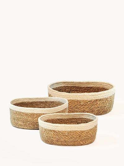 Korissa Savar Oval Bowl, natural seagrass with white trim, three nested sizes