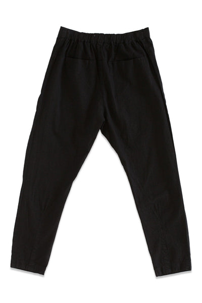 Back product view of black Souk pants with an elastic waistband.