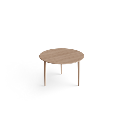 Elevated three-quarter view of the light wood Eikund Evja Round Coffee Table, showing the circular grain-patterned top, softly beveled edge, and three slender legs.