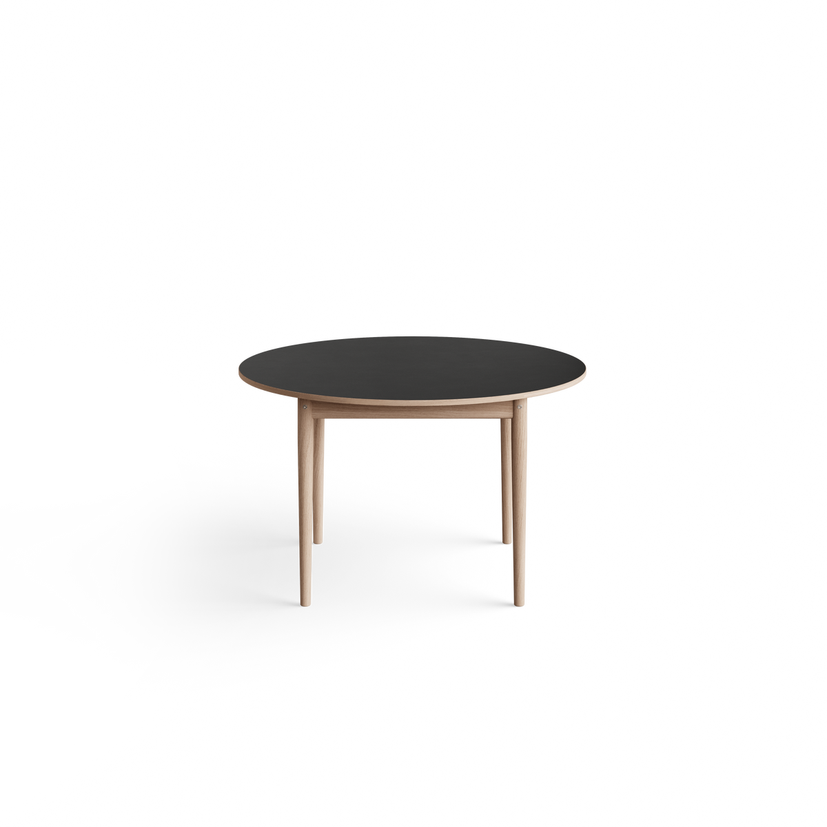 Eikund Oma Static Dining Table with a dark charcoal round top, contrasting light wood edge, and tapered wood legs, viewed against a white background.