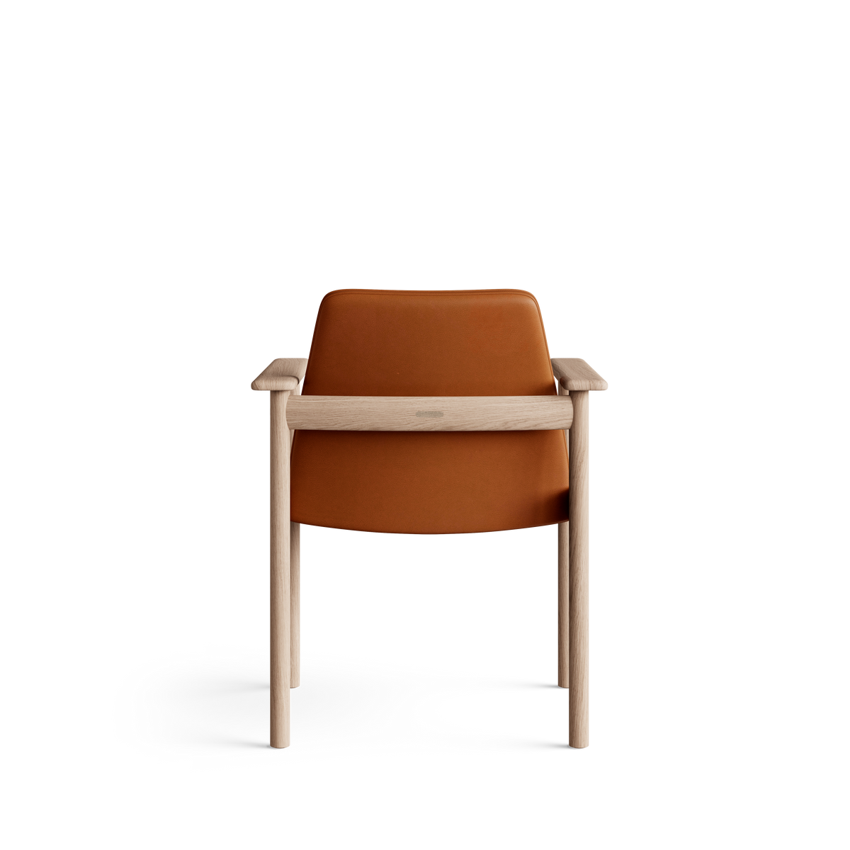 Rear view of the cognac-orange Eikund Ry Arm Chair, showing the smooth curved back panel, horizontal light wood rail, and slender rear legs against white.