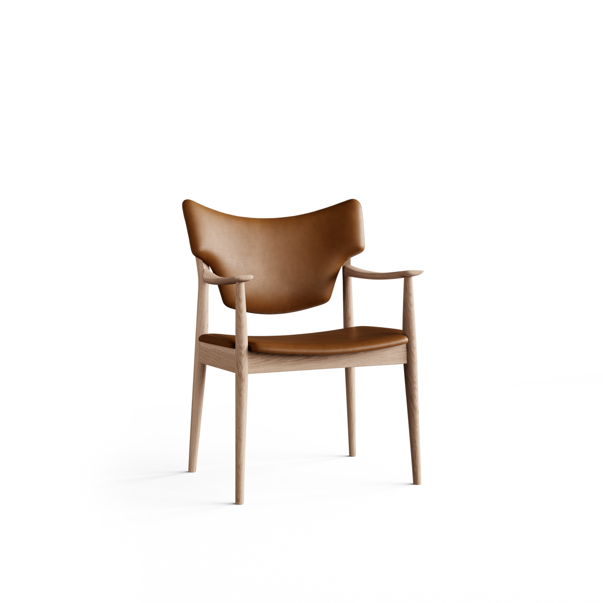 Three-quarter front view of the Eikund Veng Arm Chair with cognac-brown upholstery and a light wood frame, showing a wing-shaped curved back, slim padded seat, sculpted armrests, and tapered legs.