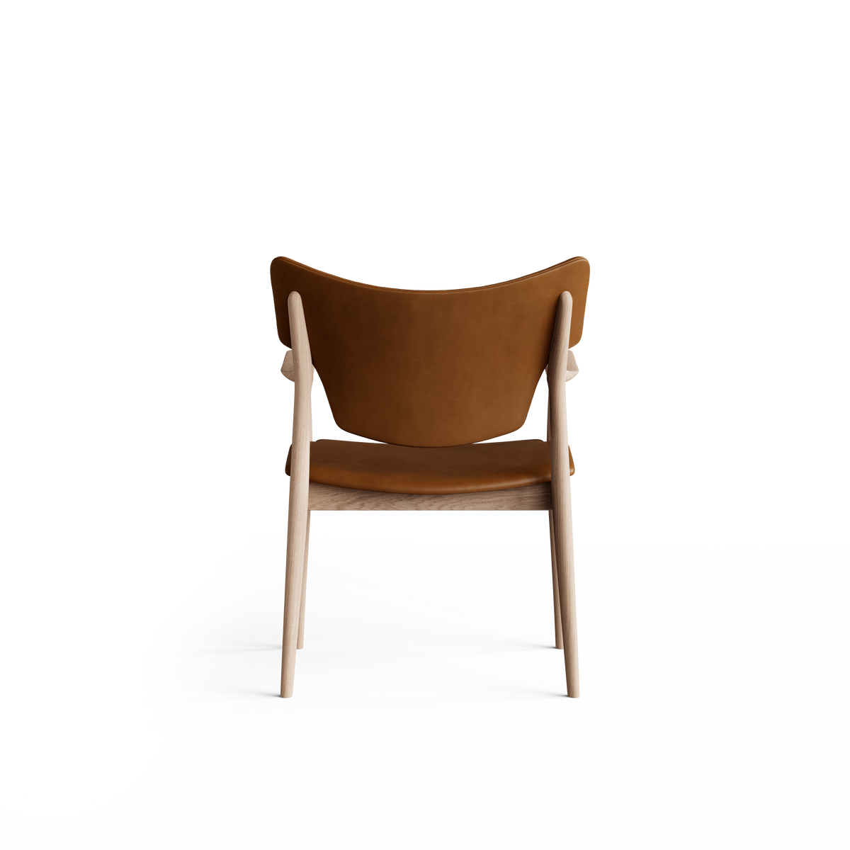 Rear view of the cognac-brown Eikund Veng Arm Chair, showing the curved upholstered back between light wood uprights and an open gap above the seat.