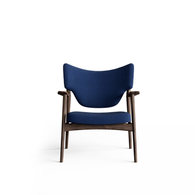 Front view of the blue Eikund Veng Lounge Chair, showing the sweeping backrest, open gap above the seat cushion, and outward-curving wood armrests.