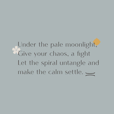 Powder blue graphic reading, “Under the pale moonlight, give your chaos a fight. Let the spiral untangle and make the calm settle”