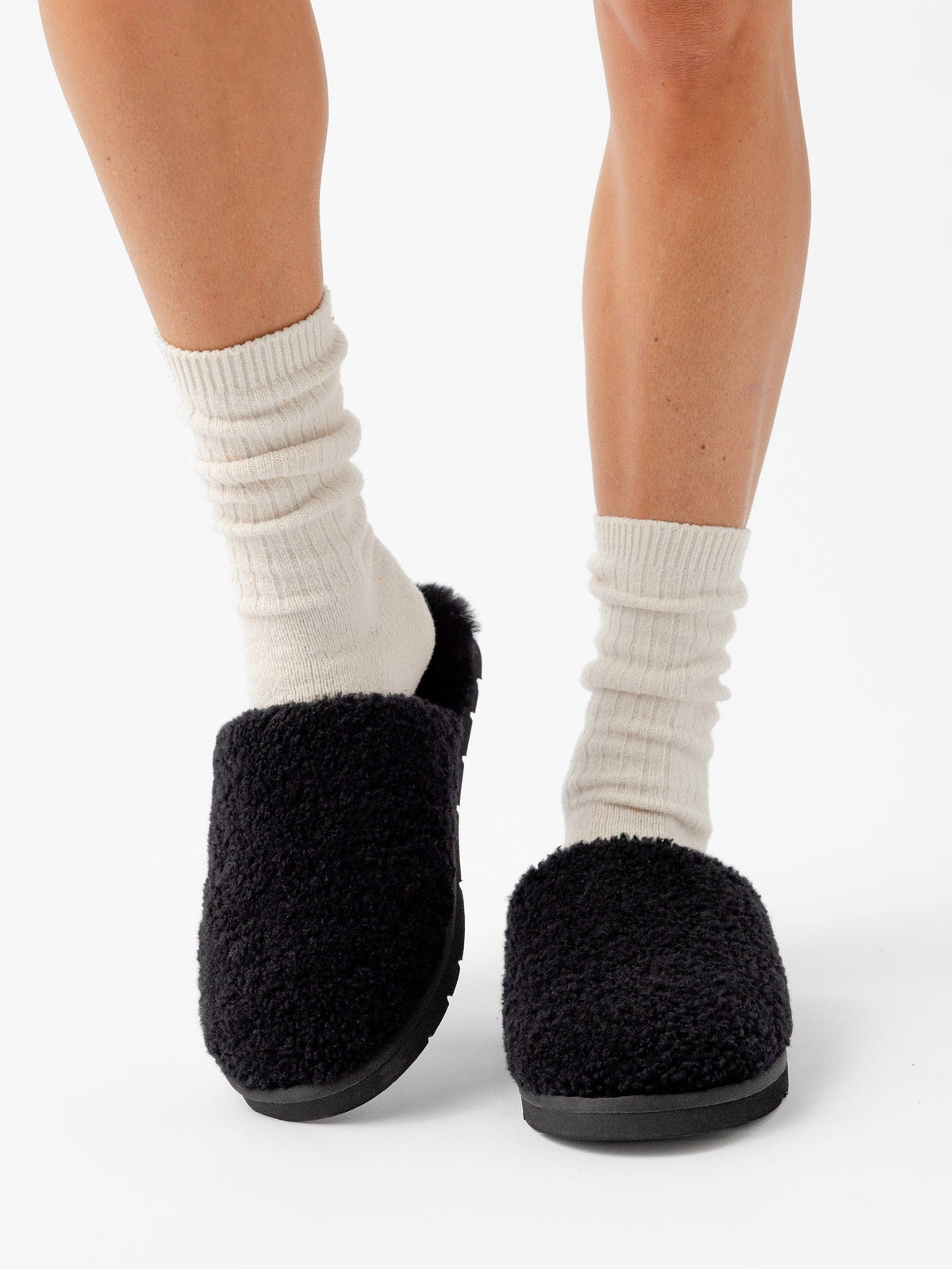 Puffy Sheep Slipper in Espresso - side view showing shearling texture