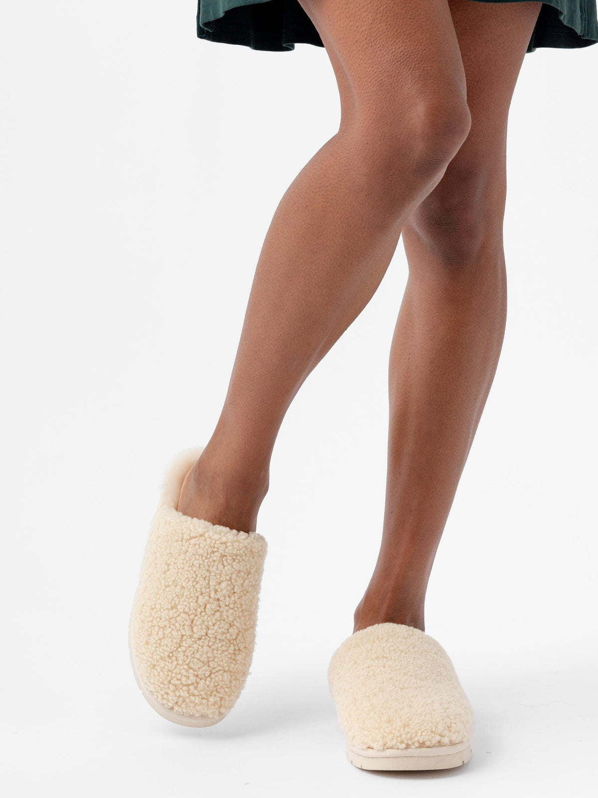 Puffy Sheep Slipper in Natural - side view showing shearling texture