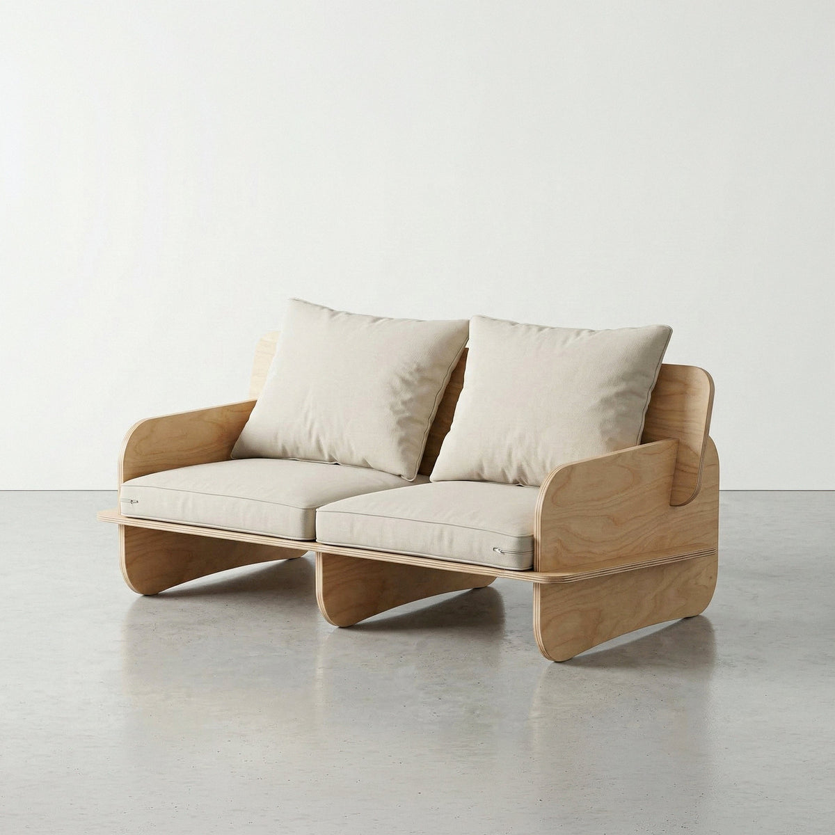 Studio view of the Franklin two-seat low seater with two white back cushions, divided seat cushions and a natural wood platform frame