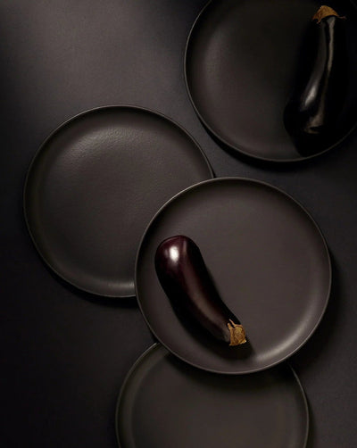 Gharyan Stoneware Japandi Tableware 12pc Dinnerware Set, Matte Black, styled with eggplant
