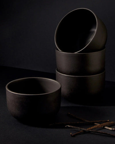 Gharyan Stoneware Japandi Tableware 12pc Dinnerware Set, Matte Black, bowls stacked with utensils