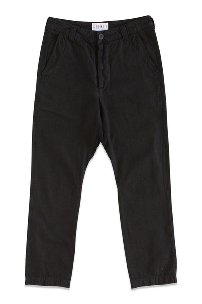 Front product view of black Vet Chinos with a buttoned waistband, zip fly, side pockets, and tapered legs.