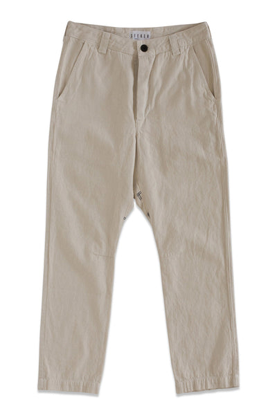 Front product view of light beige Vet Chinos with a buttoned waistband and tapered legs.
