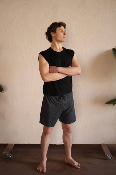 Relaxed-fit men's merino wool shorts designed for sauna sessions, recovery routines, and comfortable everyday wear.