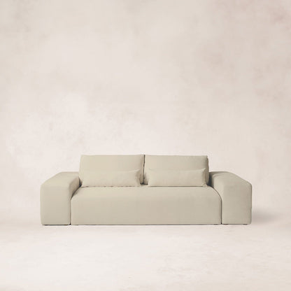 Ojai sofa with low profile, wide arms, and neutral linen fabric
