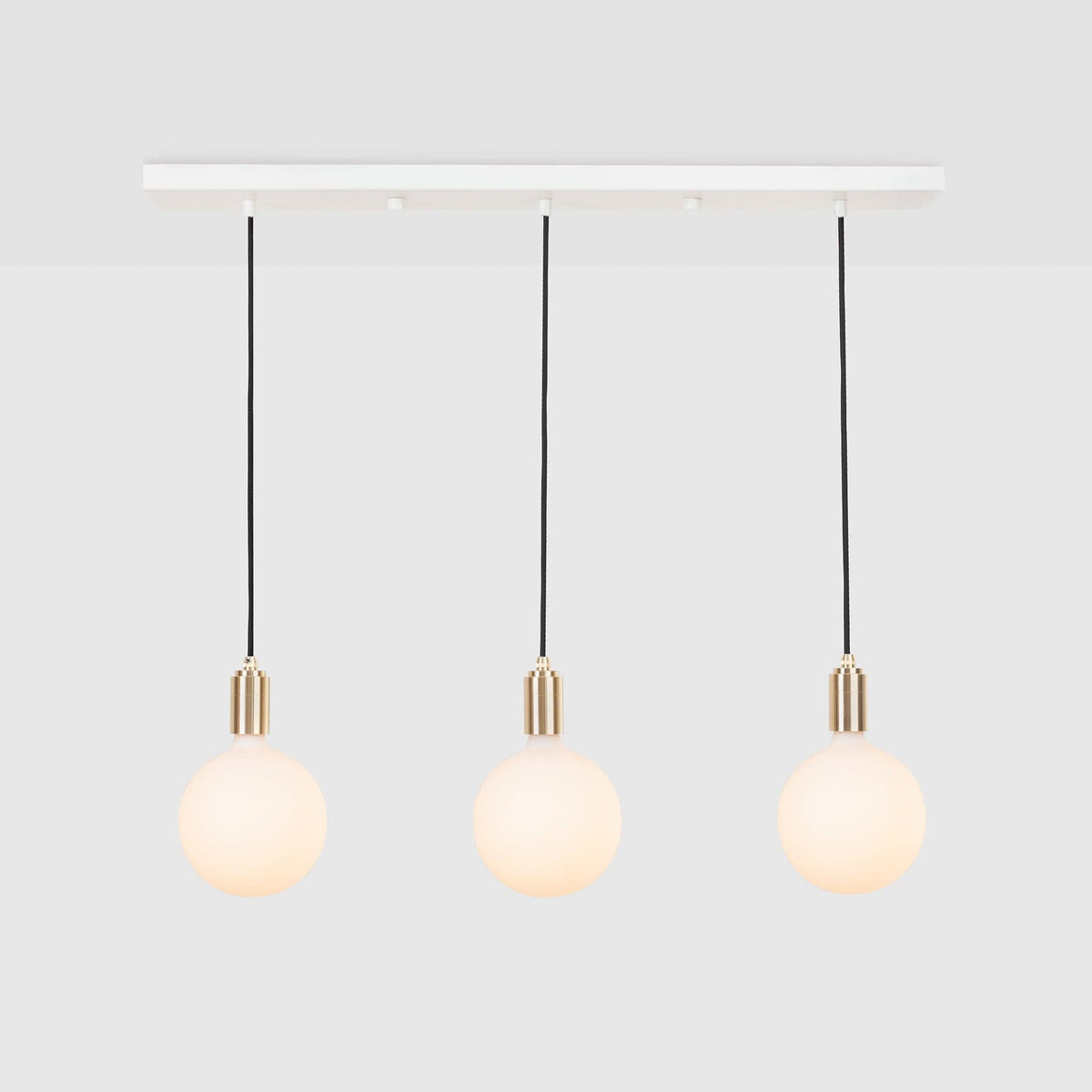 Linear Triple Pendant in Brass + Sphere IV