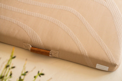 Brigette Romanek | Taupe Dog Bed or Bed Cover closeup with background