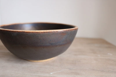 Brown handmade ceramic cereal bowl with warm earth glaze