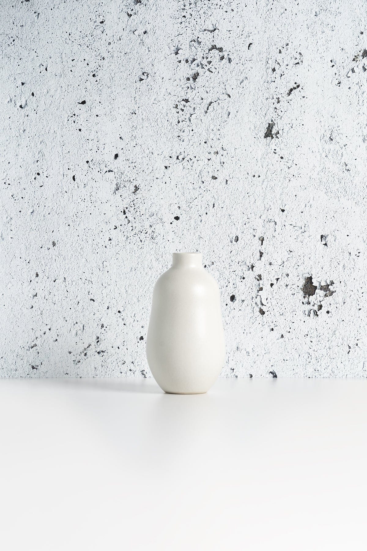 Gharyan Stoneware Vase, white, against speckled textured background