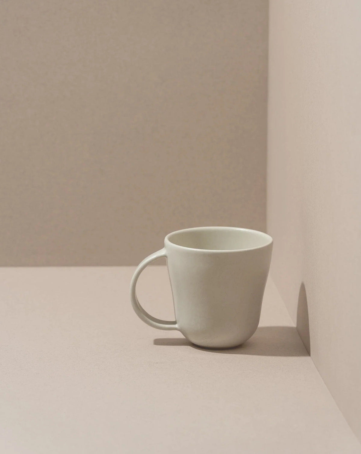 Gharyan Stoneware Japandi Tableware Mug, Matte White, warm-toned background