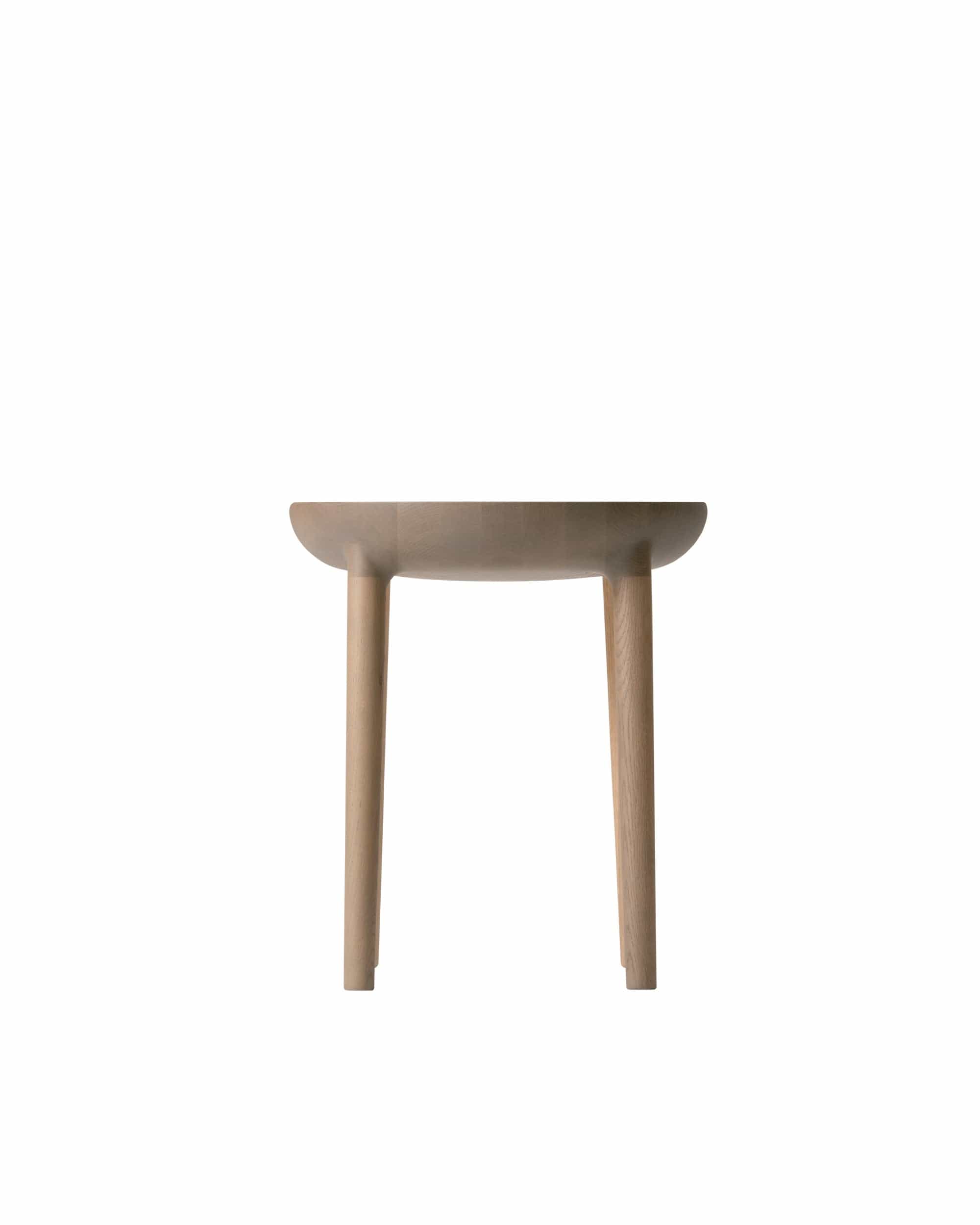 CRUST Stool in natural oak, showing asymmetrical seat detail — Japandi modern accent stool at ShopJapandi.com.