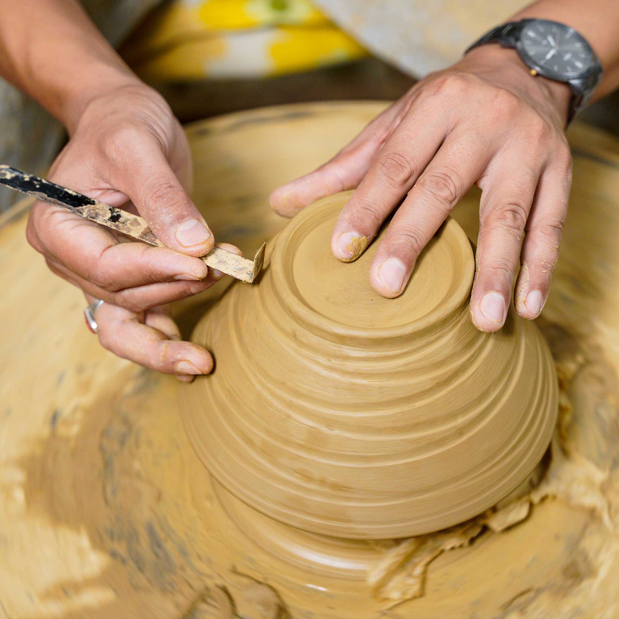 Chopsticks & Terracotta Bowl Set being handmade
